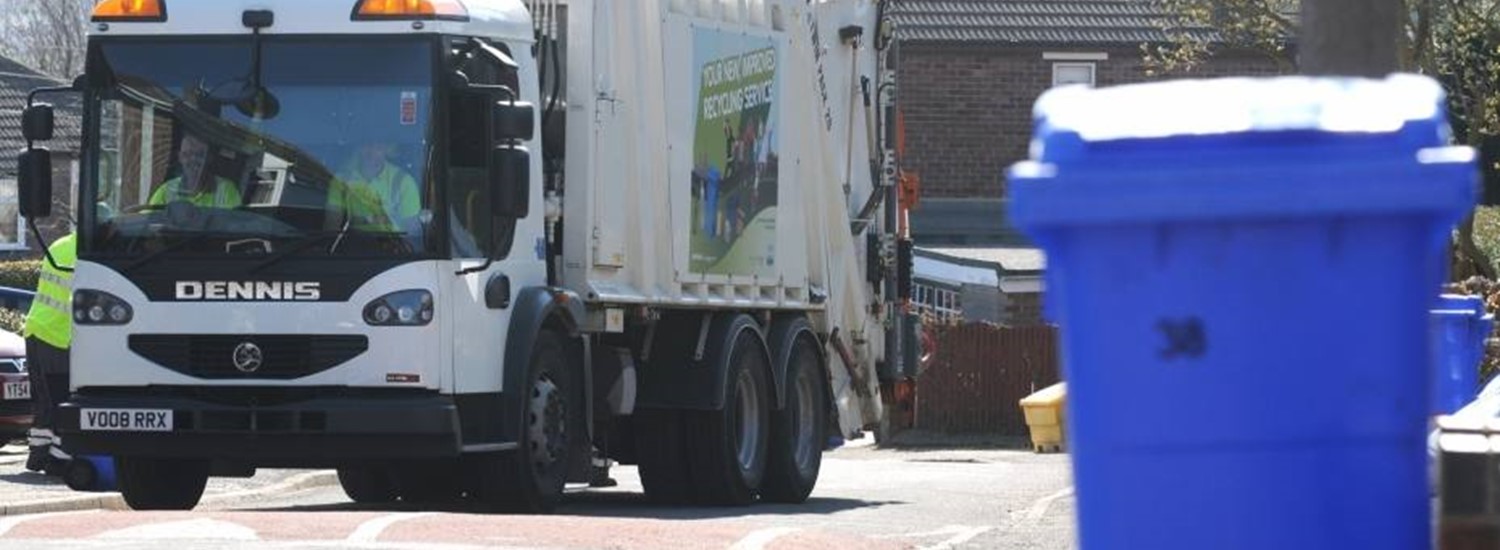 bin lorry and blue bin