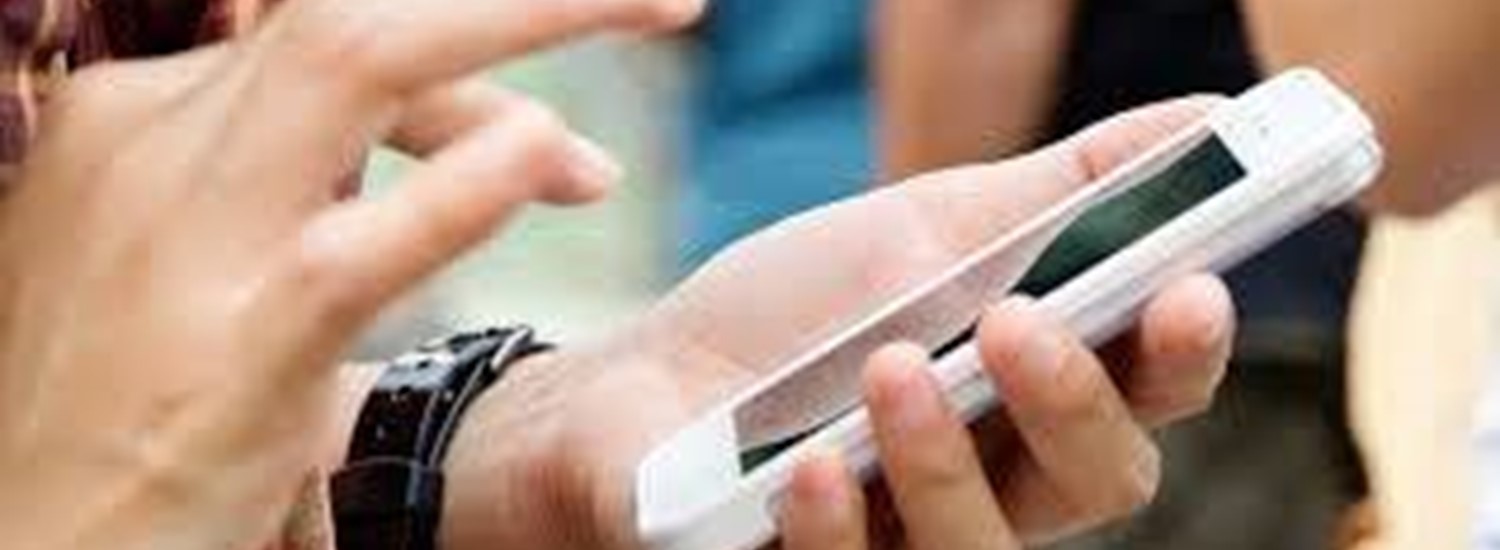 Someone typing on their phone